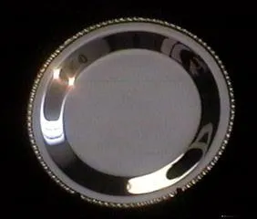 plato-redondo-de-acero-con-moldura-perle-de-alpaca-nevey